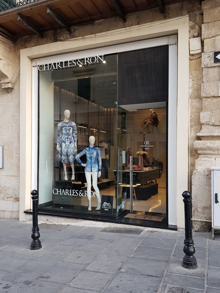 window shop with mannequins at Charles and Ron Valletta