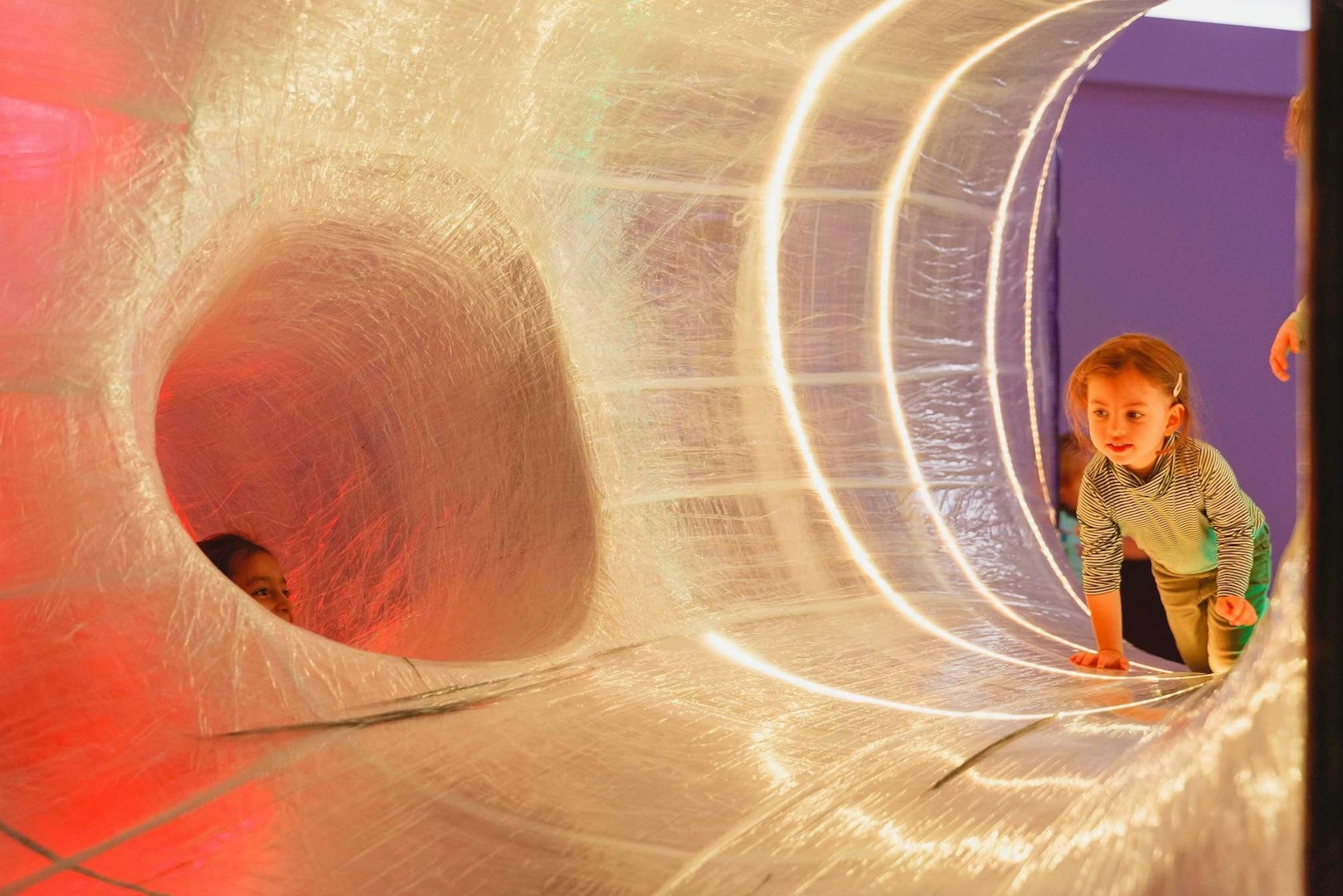 a tunnel where kids play at Brooklyn Children's Museum