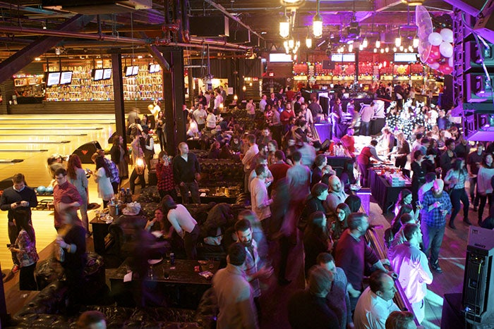 people enjoying a party at the Brooklyn Bowl bowling bar