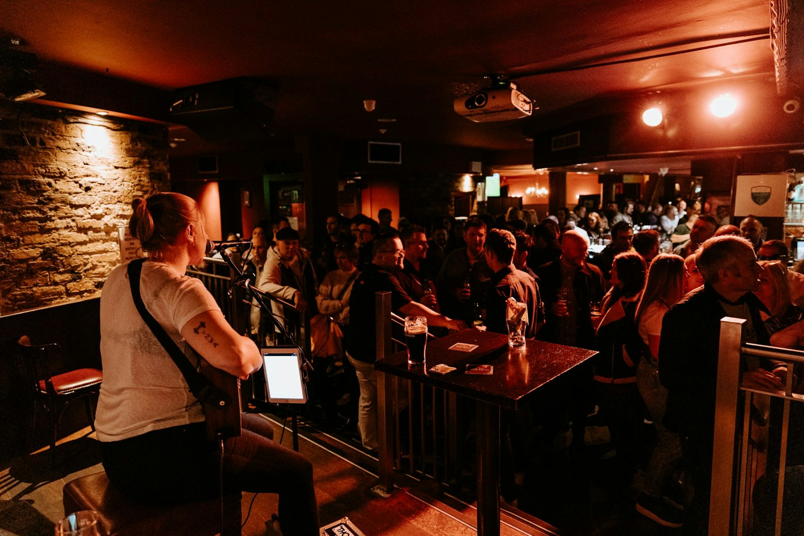 a band playing live and audience at Fitzsimons bar