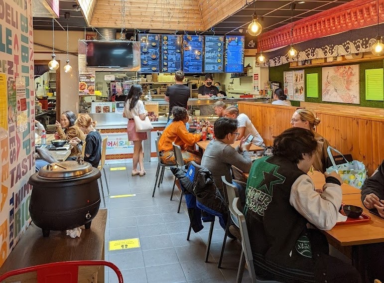 people enjoying food at Han Sung Asian market 