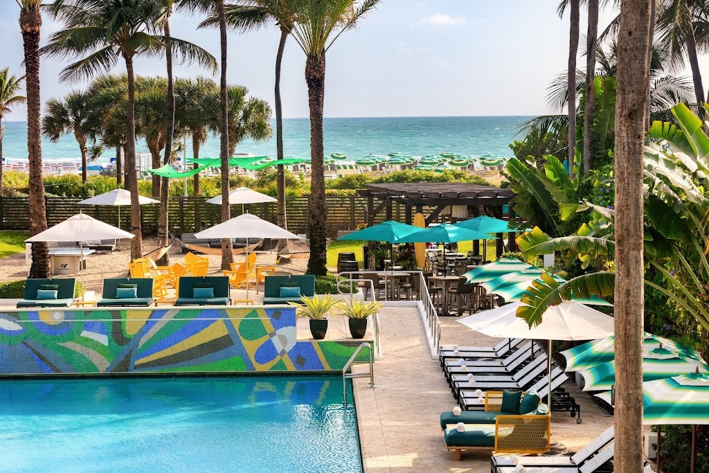 pool and beach side at Kimpton Surfcomber Hotel