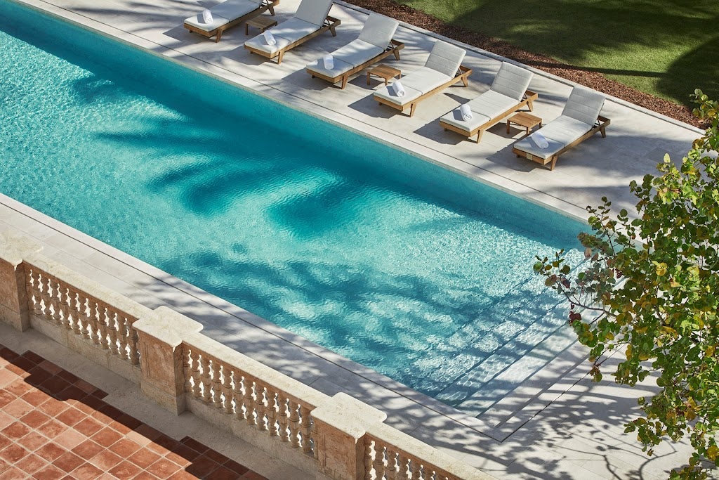 elegant pool at the Four Seasons Hotel at The Surf Club