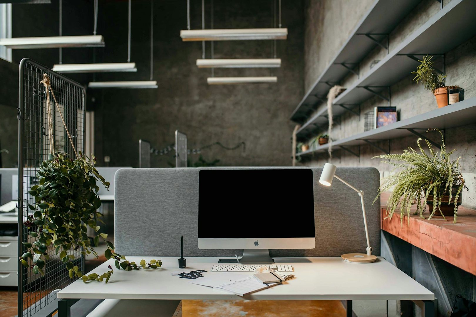 Desk with a computer at Friday Cowork in Antwerp