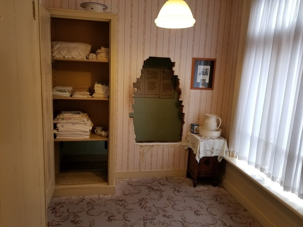 a whole in the wall at the Corrie Ten Boom museum