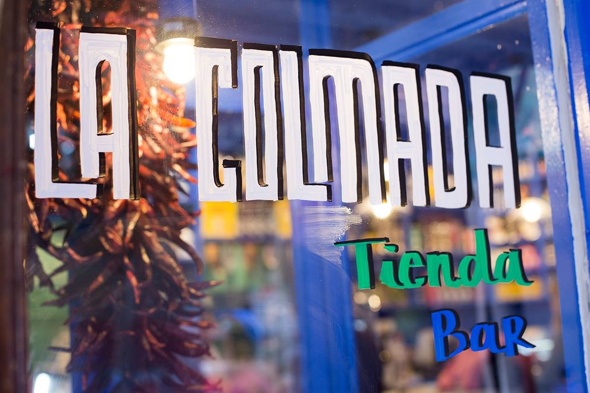 Painted shopwindow of La Colmada in Madrid