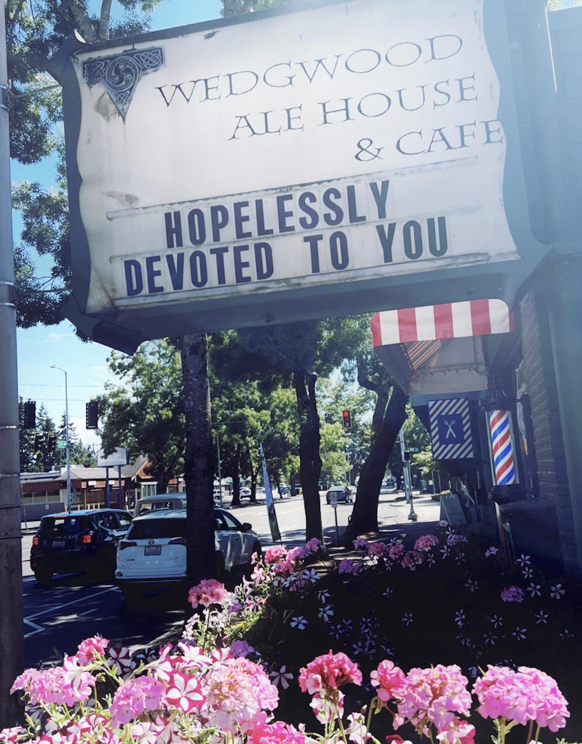 Letter sign and pink flowers outside of Wedgwood Ale House