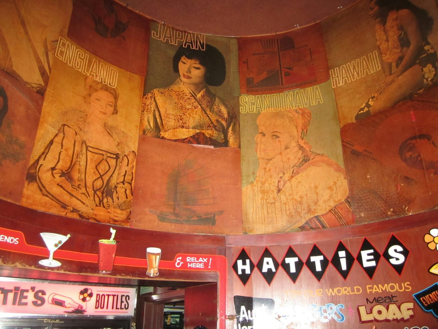 Artwork above the bar at Hattie's Hat