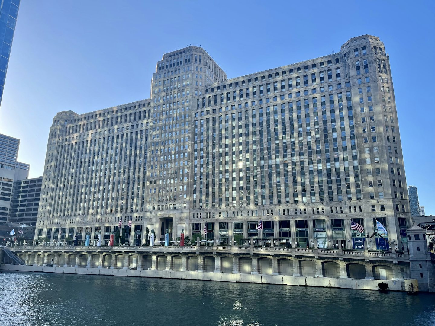 the imposing building of the Mart by the waterside of Chicago