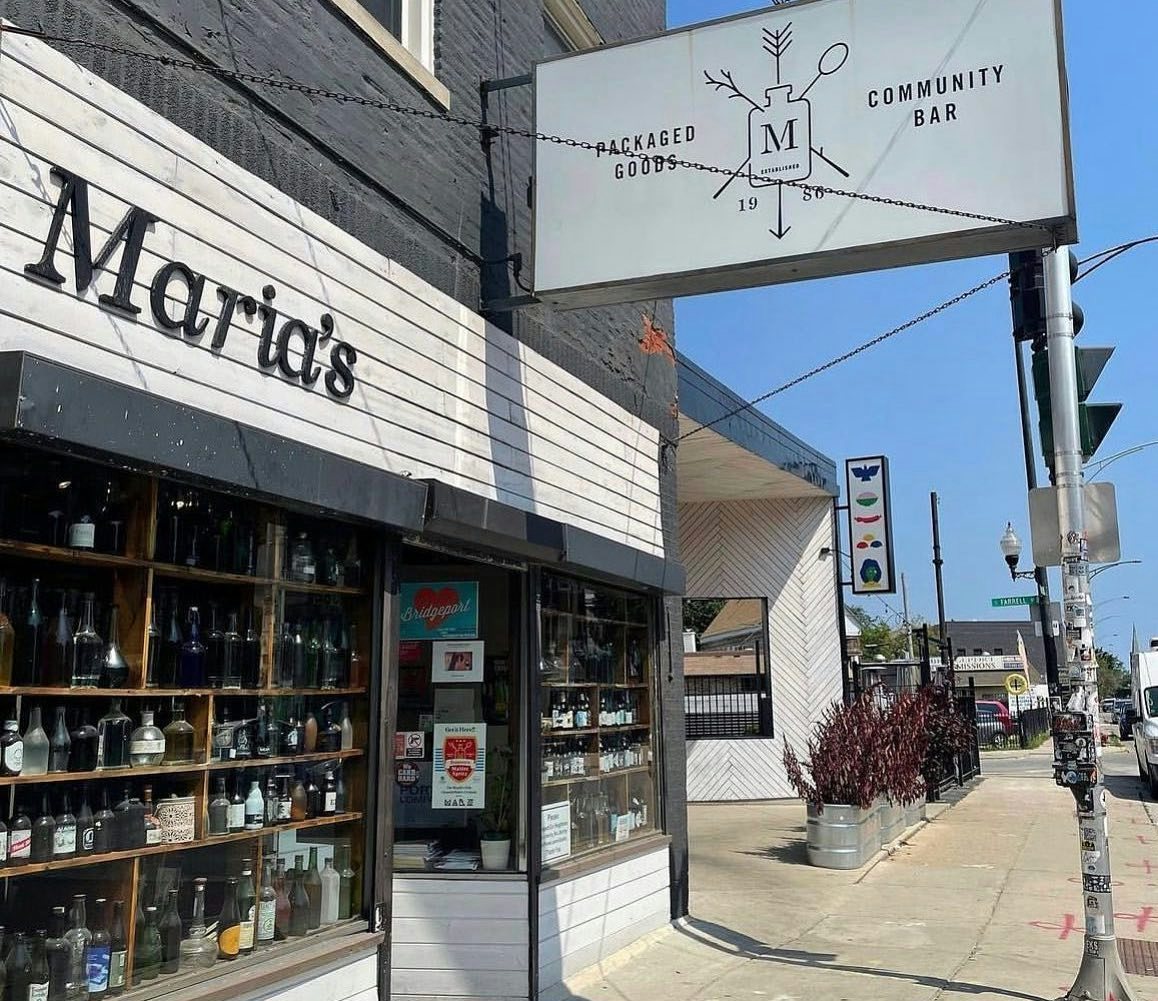 window display filled with liquors at Maria's Packaged Goods and Community Bar