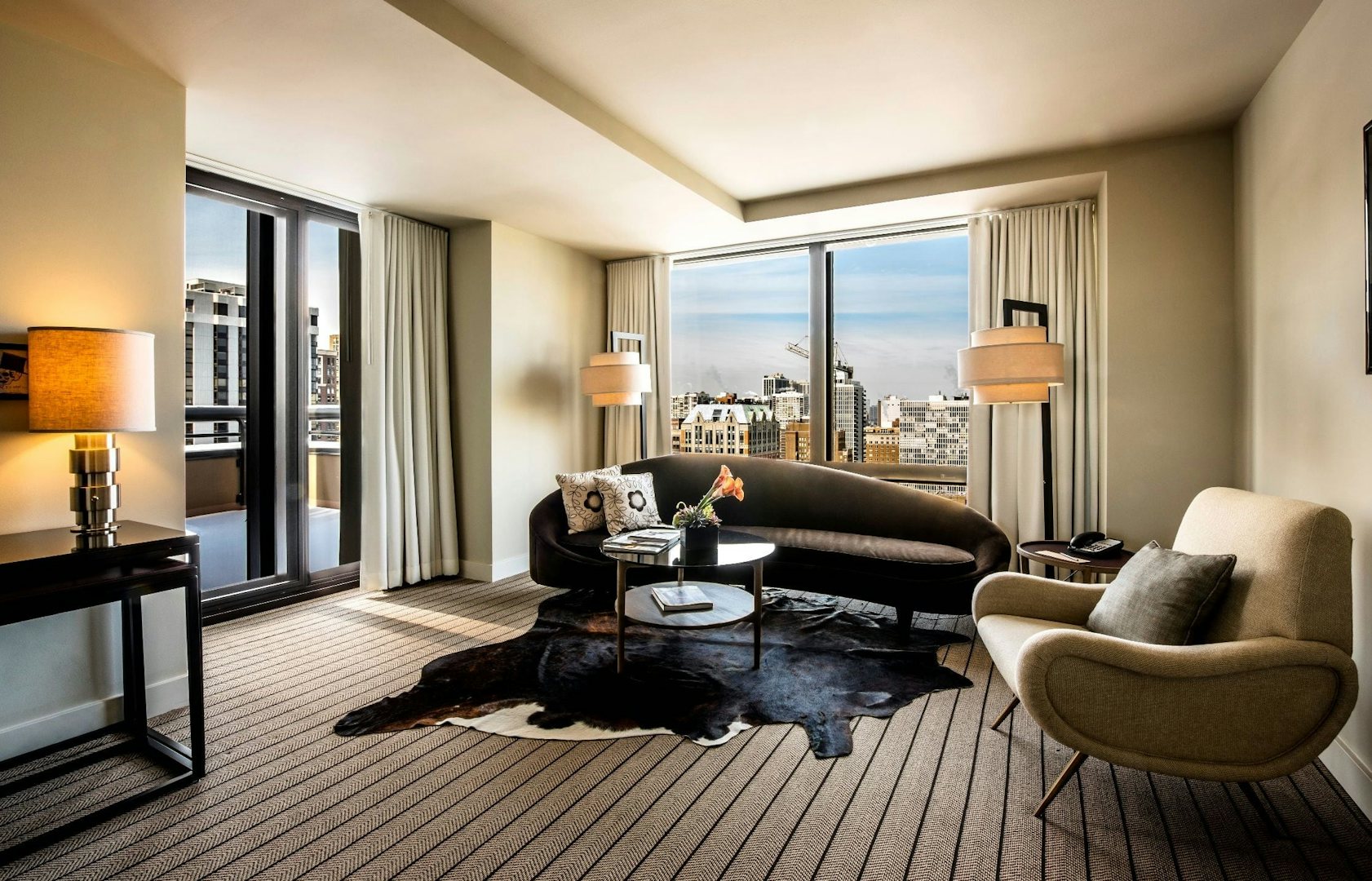 an elegant room with city-view at the Thompson Chicago