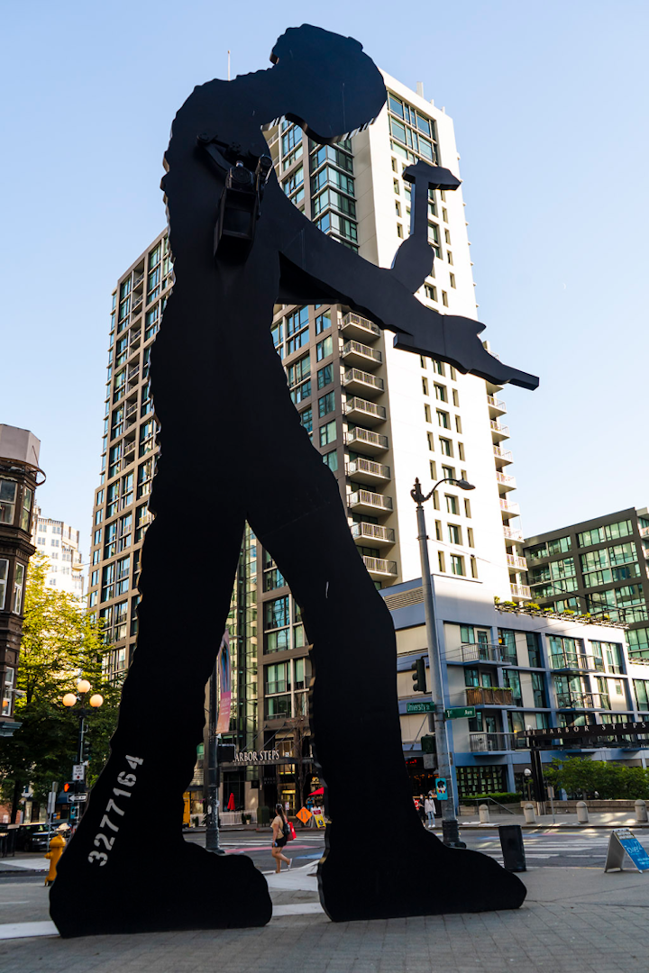 statue of a hammering man in Downtown Seattle