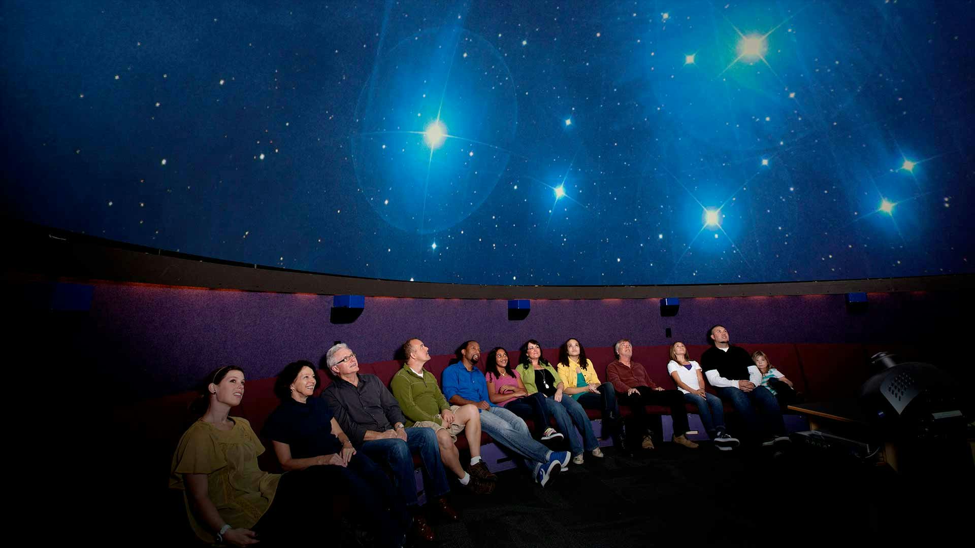 people enjoying the show at the Laser Dome in Seattle