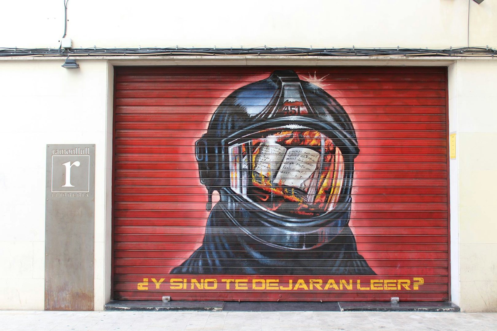 shop front and wall art at Ramon Llull Libreria in Valencia