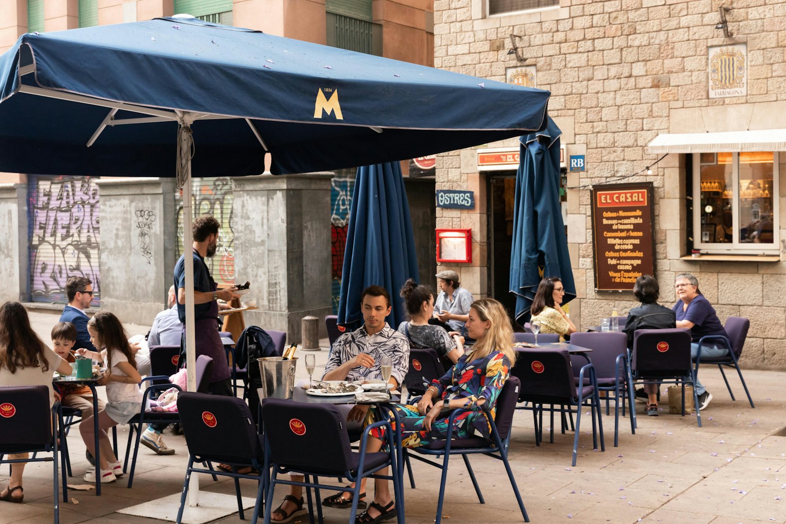 people enjoying the terrace of El Casal in Barcelona