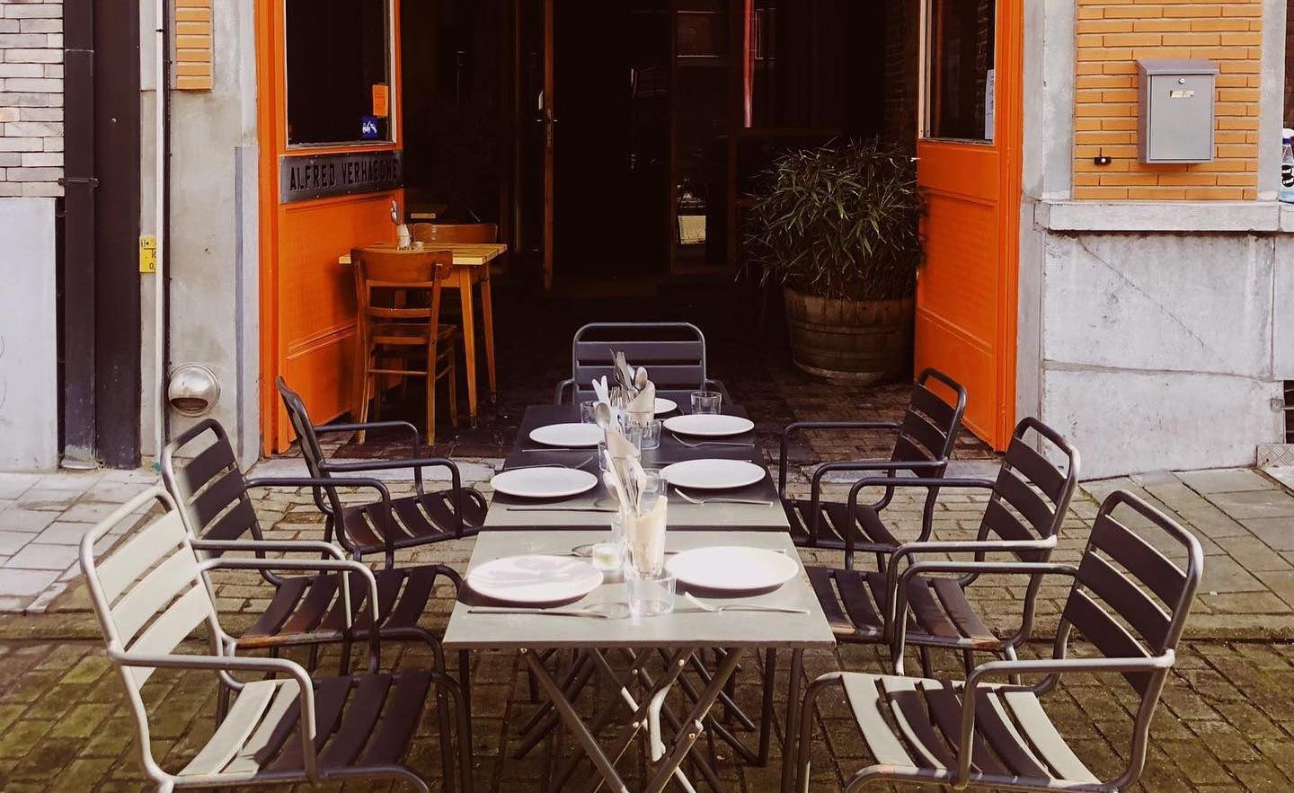 a set table on the terrace of Raaf restaurant in Ghent