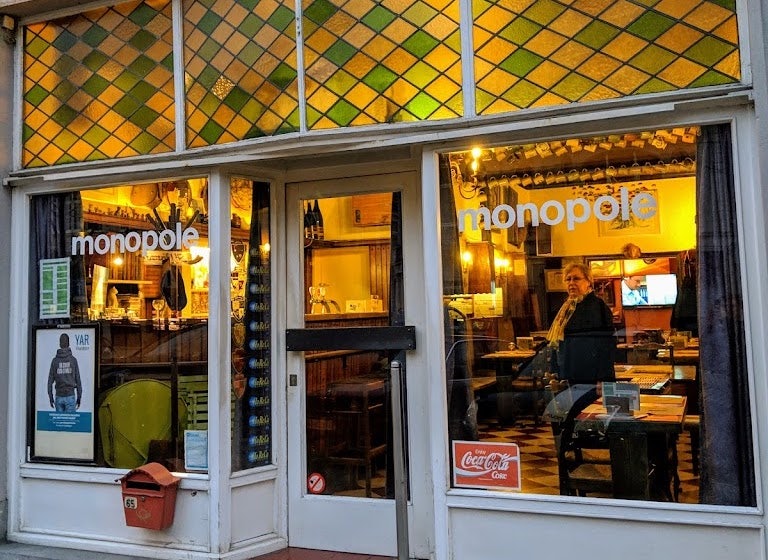 window front of Café Monopole in Ghent