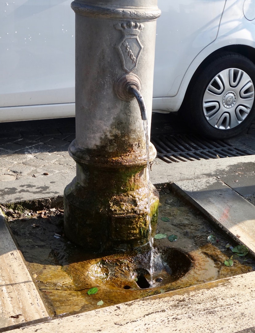 public fountain with drinking water in Rome