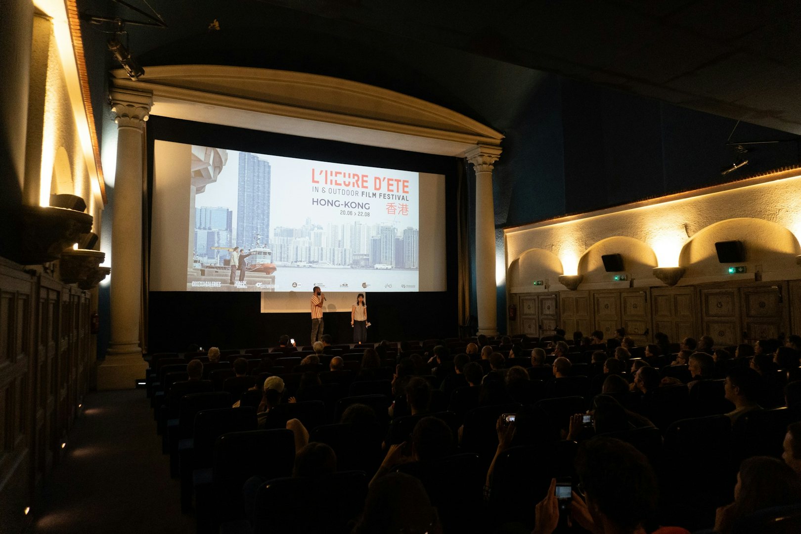 people at a movie screening in cinema Galeries
