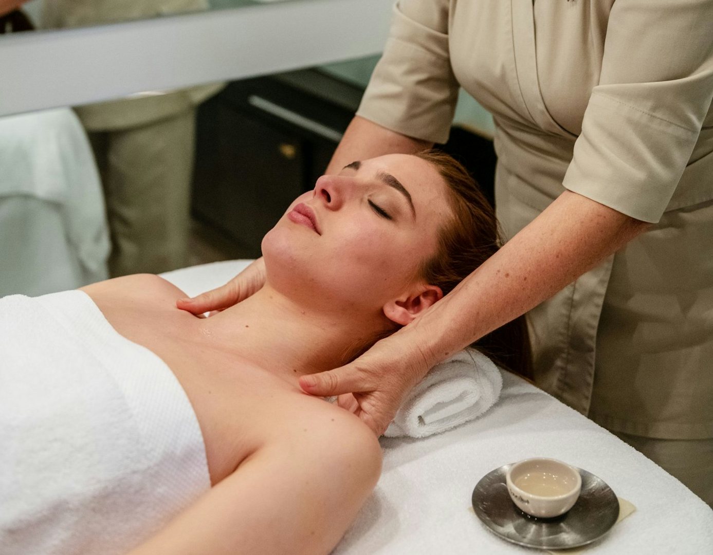 a woman getting a massage at NH Collection Venezia Grand Hotel Palazzo dei Dogi