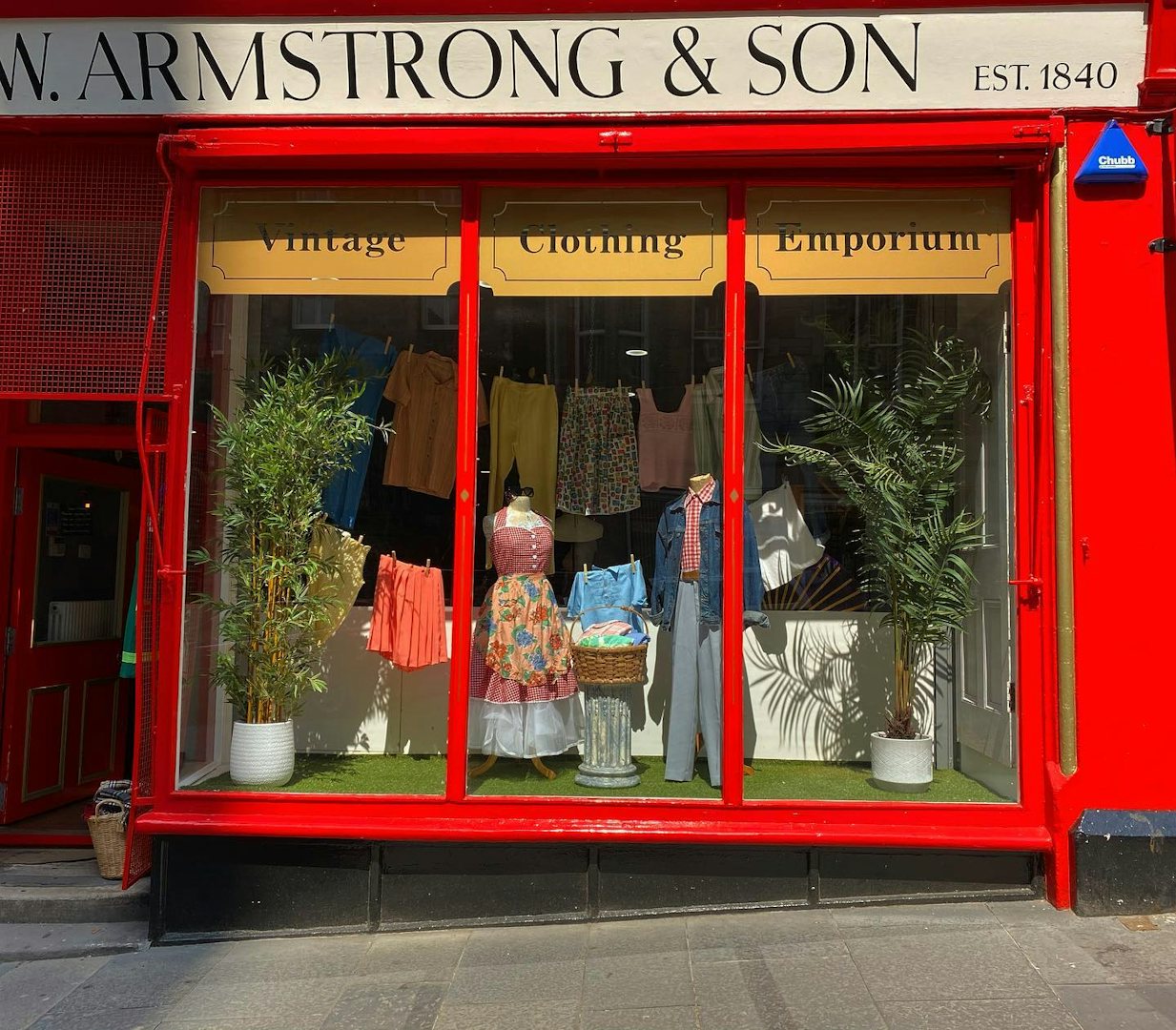 colourful store front with vintage clothing displayed at W. Armstrongs & son