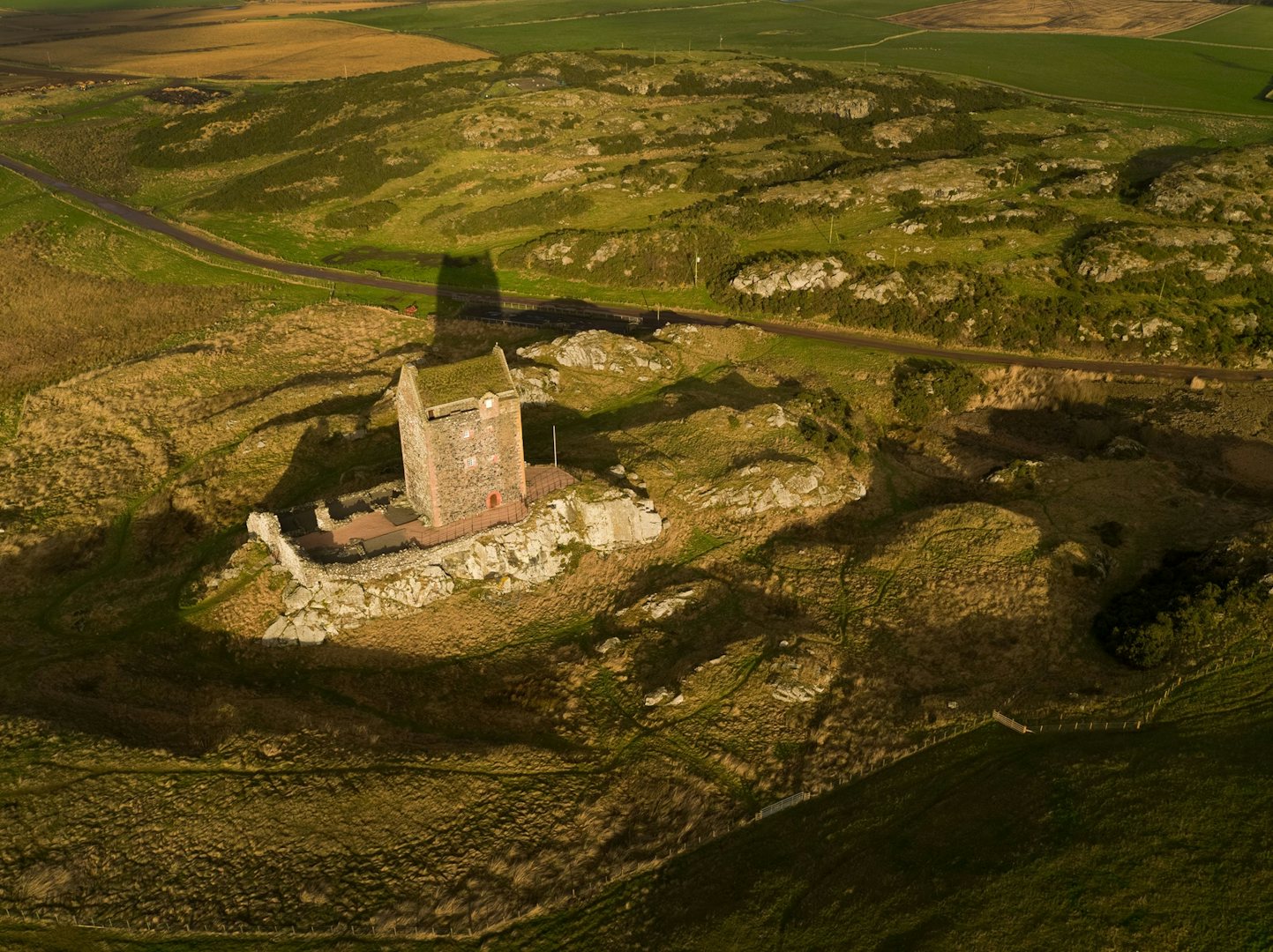 drone view over the Smailholm Tower in Scotland