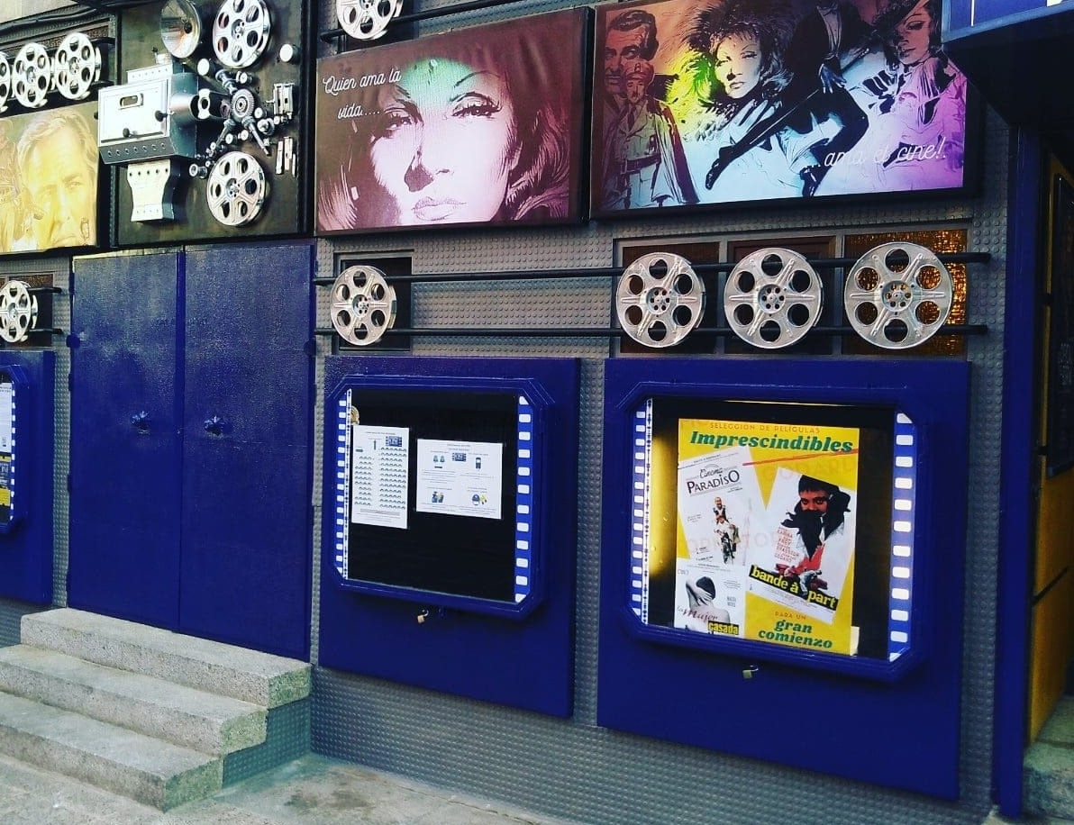 façade filled with movie posters at the Pequeño Cine Estudio